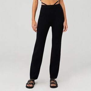 Black fitted knit pant. Form fitting, sexy. Pair w crop for curves. Large